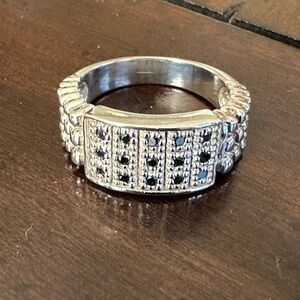 Tiny Blue Sapphires Set in Thailand 925 Sterling Silver. Size 7.75